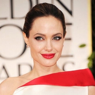 Angelina Jolie planned to have a seventh child before divorcing Brad Pitt